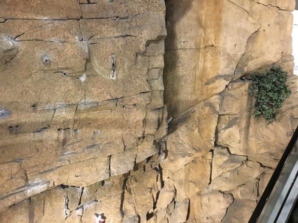 Detail of an ochre sculpted wall